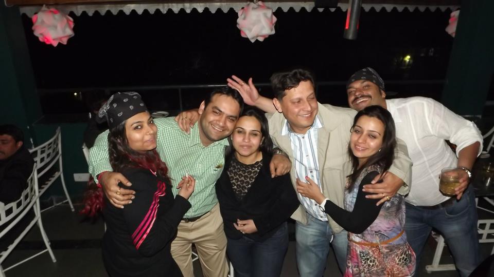 Friends enjoying Retro Night Kasauli at Hangout Rooftop Bar