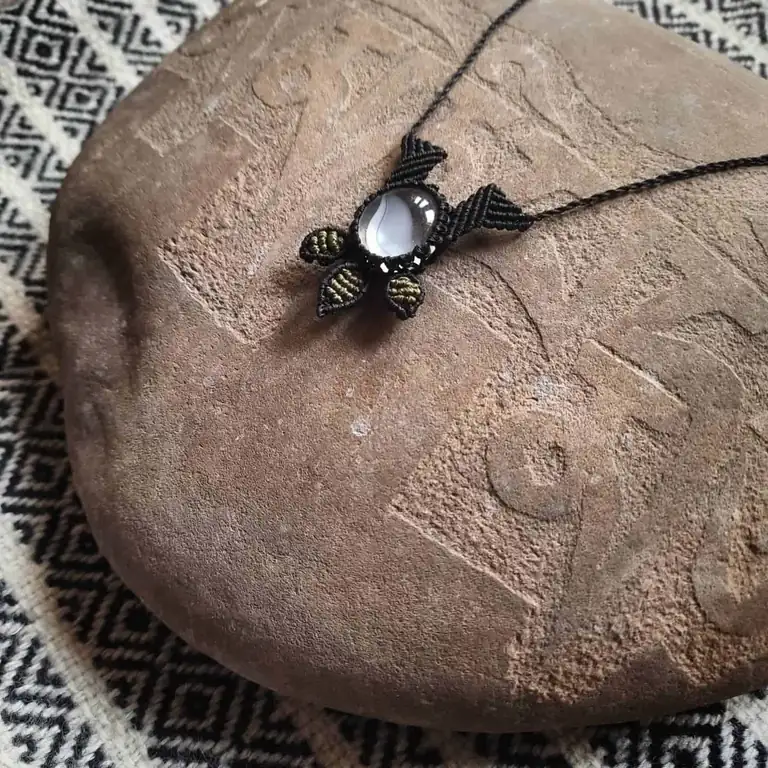 Black macrame necklace with clouded glass crystal and olive leaf knots, handcrafted by Risheywa in Kasauli