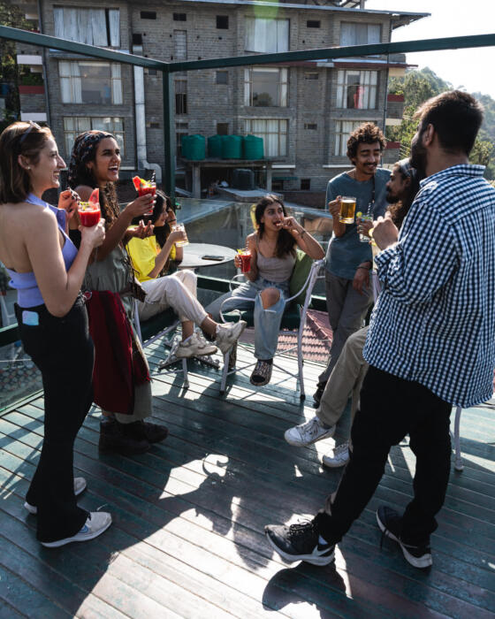 Friends on the rooftop deck at Hangout – things to do in Kasauli